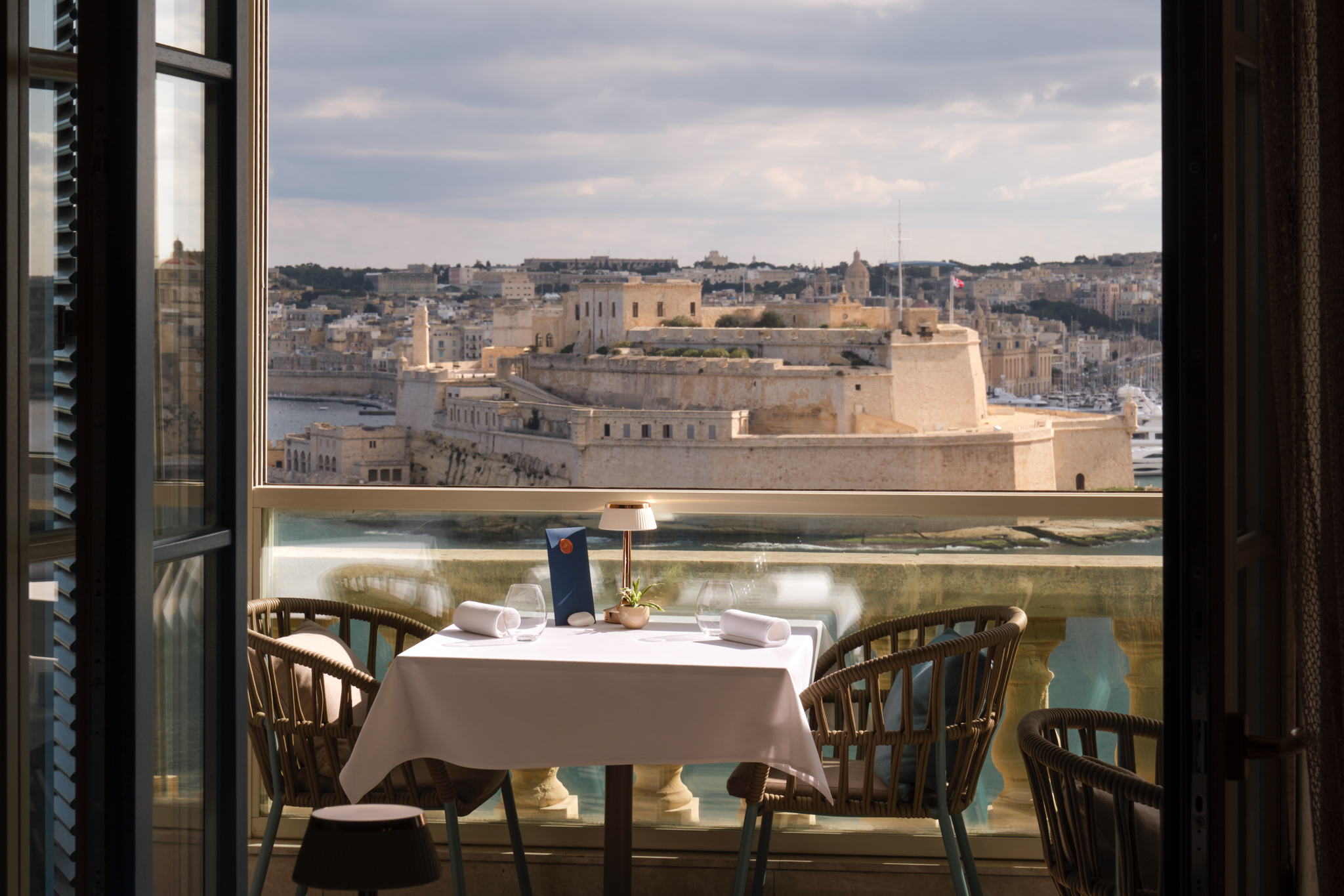 A table overlooking the Grand Harbour at Ion